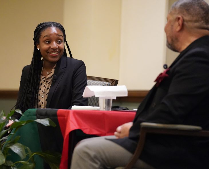 Naomi Washington '24 interviewing Bryant Colson '80 during the Elon University’s Black History Month Kickoff event in February 2022.