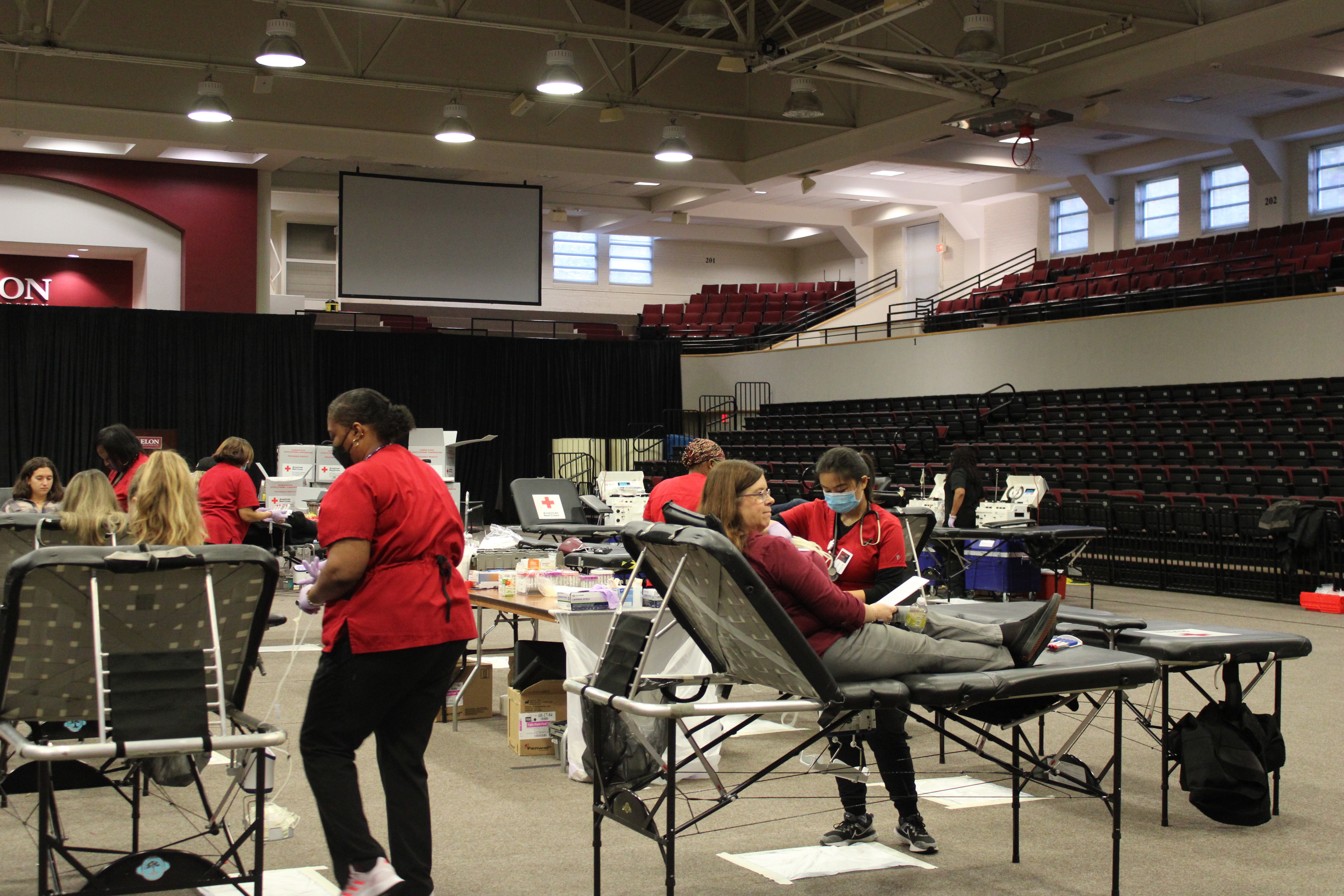 Participating donating blood during the Greek and Service Week blood drive in partnership with the Red Cross