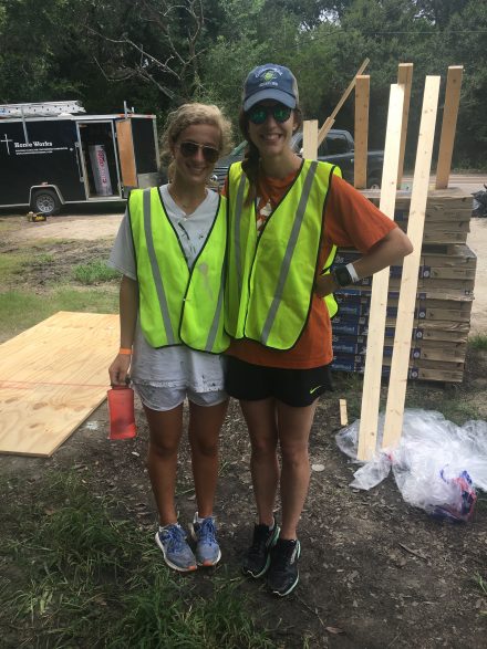 Madelyn Smith '13 on jobsite with volunteer