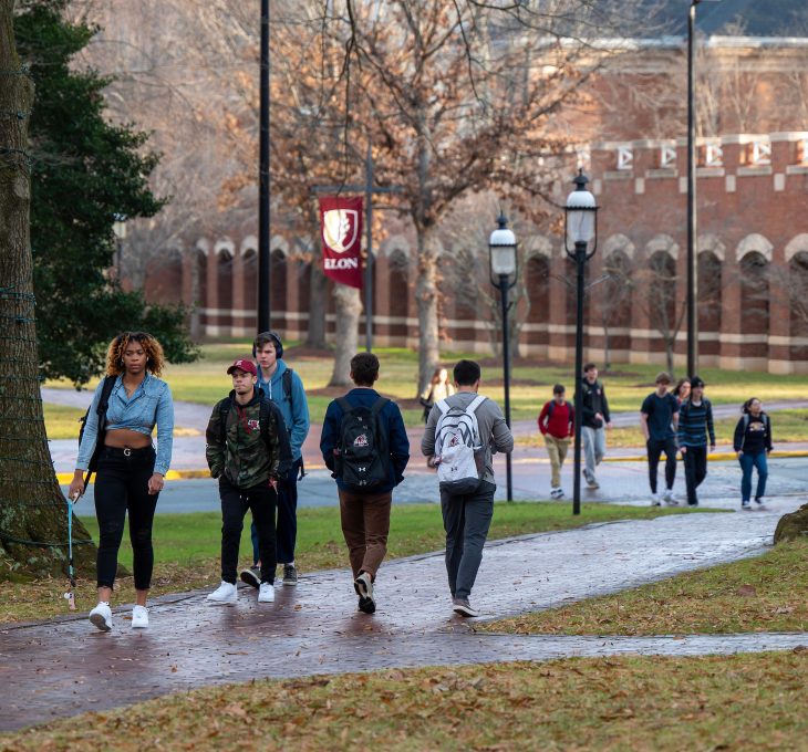 Students walk on the campus of Elon University