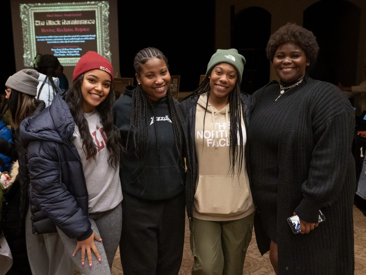 Students pose for a photo during the Black History Month Kickoff held February 1, 2023, in McKinnon Hall at Elon University.