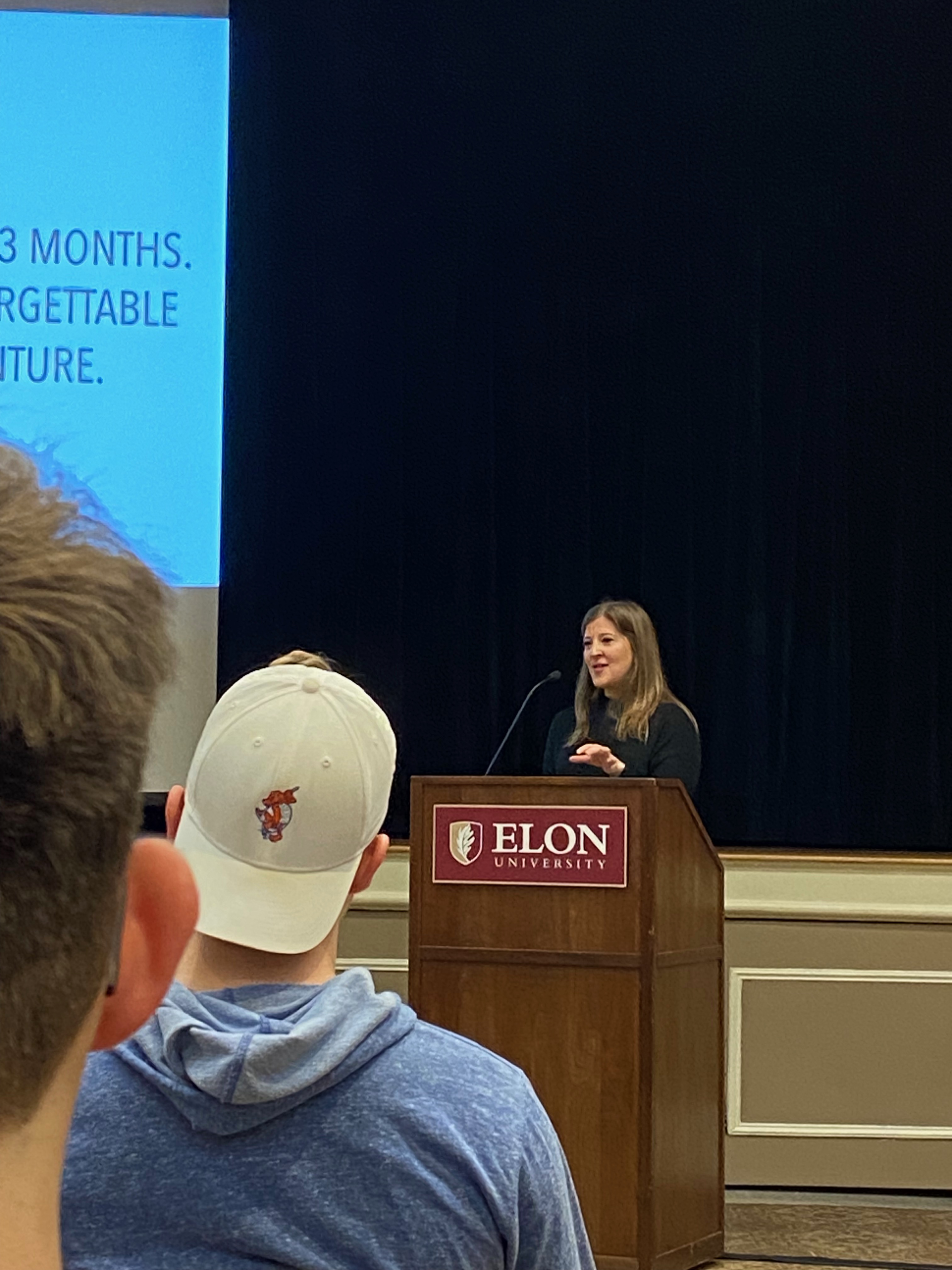 Cate LeSourd '15 speaking to a group of Elon students about life after graduation. 