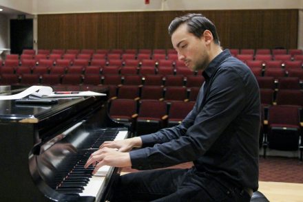 Chris Rayis plays piano in Yeager Recital Hall