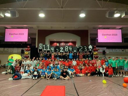 Participants at Elonthon holding signs indicating $114,000 raised this year