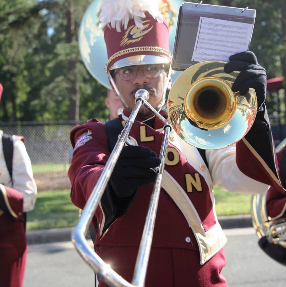 Chris Edwards II '18 plays the trombone in the Fire of the Carolinas marching band.