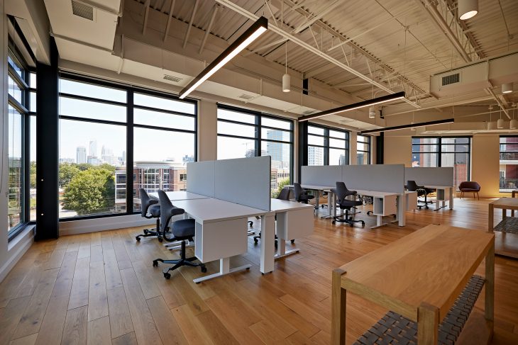 Interior workspaces in the Elon University in Charlotte facility