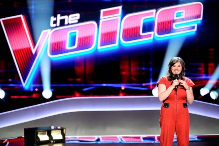 Alexa Wildish performs on a stage at The Voice
