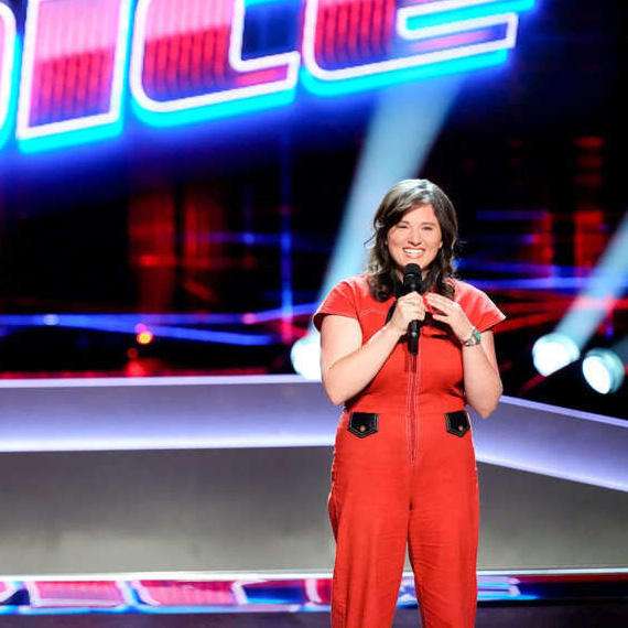 Alexa Wildish performs on a stage at The Voice