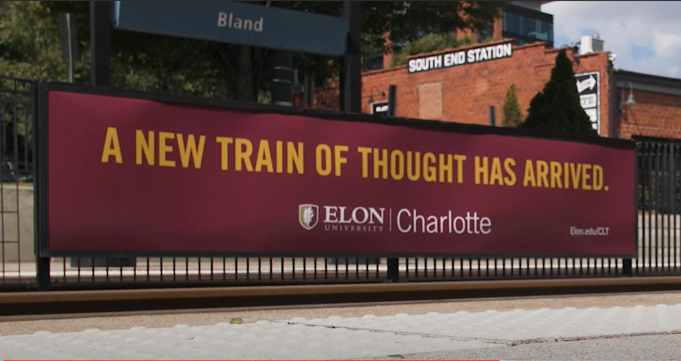 Elon ad at Charlotte commuter train station