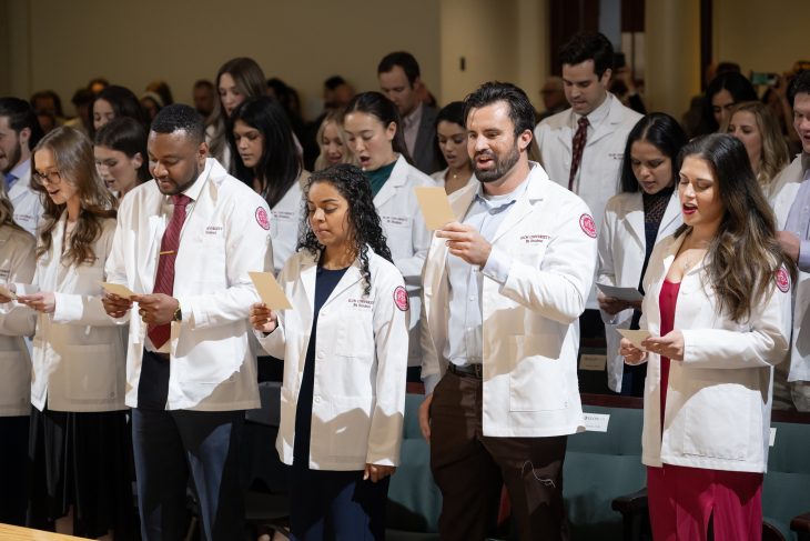 Physician Assistant students recite the PA Professional Oath at the Elon University Physician Assistant Studies White Coat Ceremony, November 17, 2023, in Whitley Auditorium.