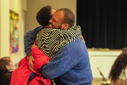 Attendees embracing at the Black Solidarity Conference on Friday, Feb. 23, 2024.