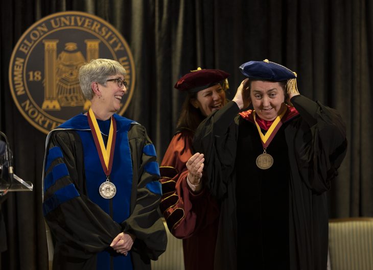 Mary Jo Festle, left, and Ann Cahill were presented with medallions in recognition of their selection as Distinguished University Professors during a formal ceremony on Tuesday, Feb. 20, in McKinnon Hall.