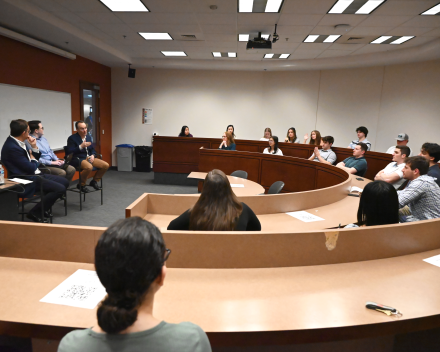 Students interact with executive at top business school
