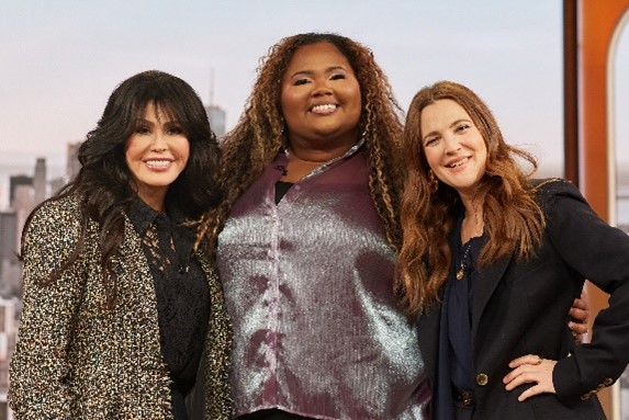 Yasmine Arrington Brooks '15 poses with Marie Osmond and Drew Barrymore on the Drew Barrymore show set.