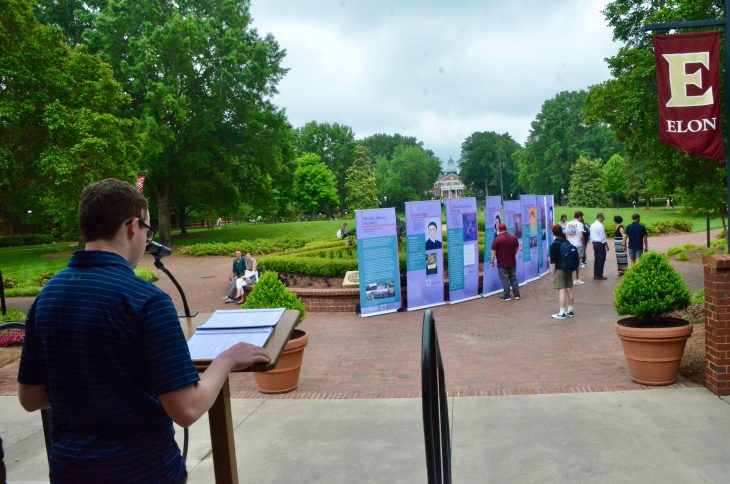 A member of the university community reading some of the names of those murdered during the Holocaust during the Reading of the Names at Elon on Monday, May 6.