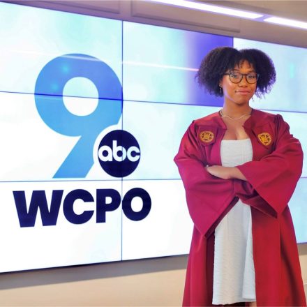 Chloe Franklin ’24 stands before a WCPO 9 logo.
