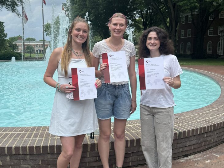 Elon students recognized for completing the Peace Corps Prep Program in 2023-2024: Lily Hill '25, Eliana Olivier '24, and Abby Brantman '24.