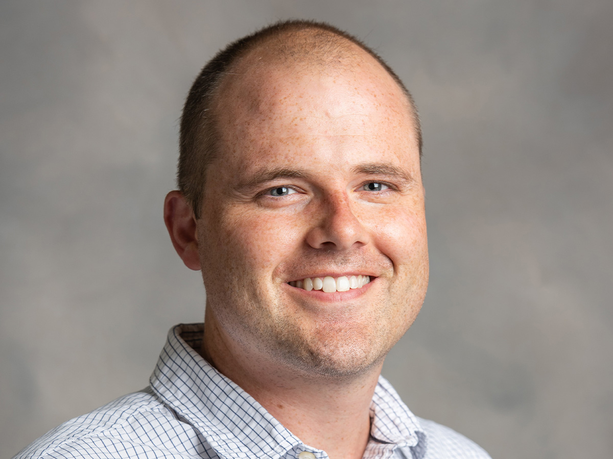 Man smiles at camera