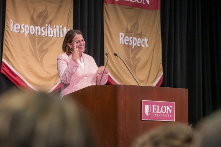 Connie Book speaks from the podium