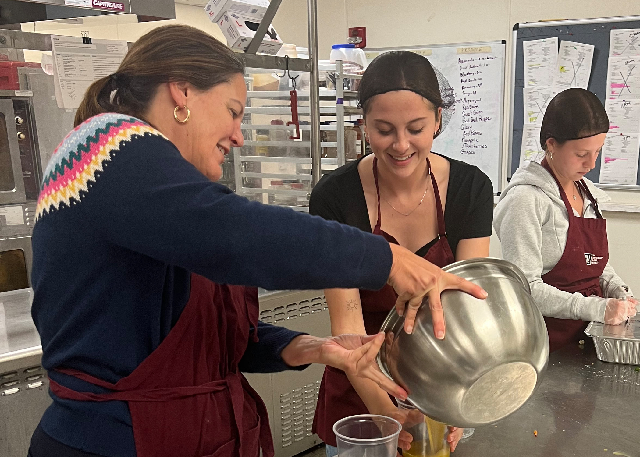 Connie Book and Lillian Argabrite cook