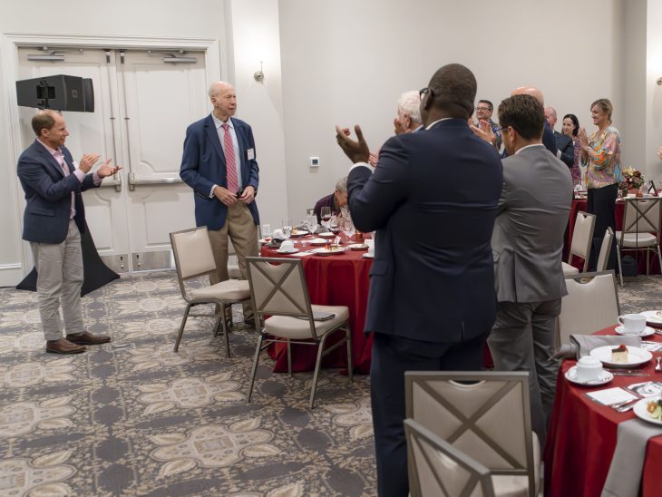 David Gergen, a former adviser to four American presidents, receives a standing ovation during a Sept. 12, 2024, banquet in his honor as he concluded his service as chair of the Elon Law Board of Advisors.