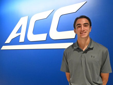 Anthony Bamford with the ACC logo