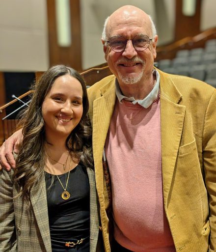 Maria Ramirez Uribe and Rich Landesberg stand shoulder to shoulder.