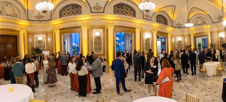 Guests mingle during cocktail hour at the Evening for Elon in DC event at Union Staion.