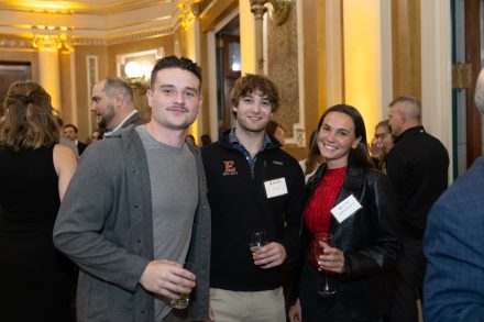 guests pose for a photo at the event