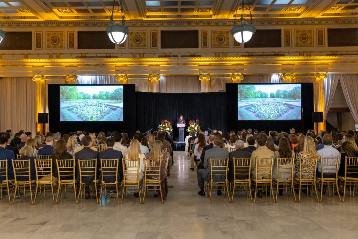 guests listen to the program while seated