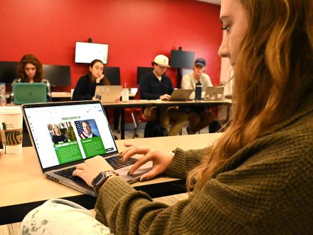 Junior Audrey Geib sits in an Elon classroom.