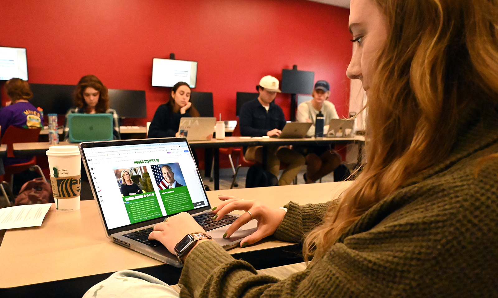 Junior Audrey Geib sits in an Elon classroom.