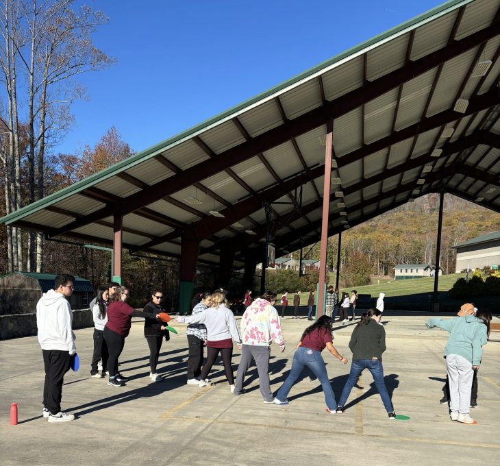 Students form a line during teambuilding activity