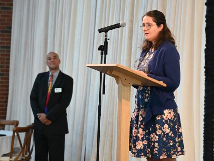 Allison Carter, Elon University alumna, speaks at presentation.