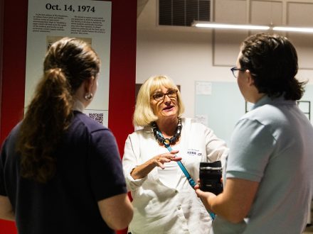 Debbie Cochran ’75 stands in ENN newsroom.