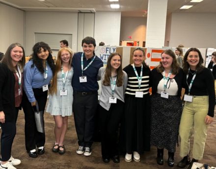 A group of students pose for a photo