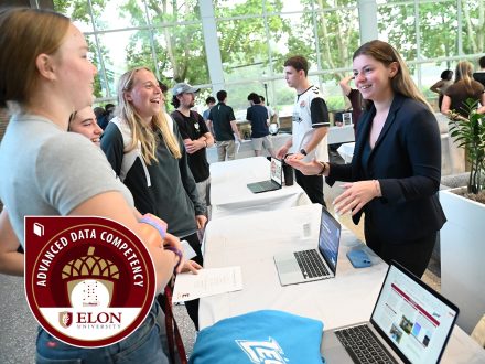 Tess Hawthorne ’25, a sport management student, stands in the School of Communications.