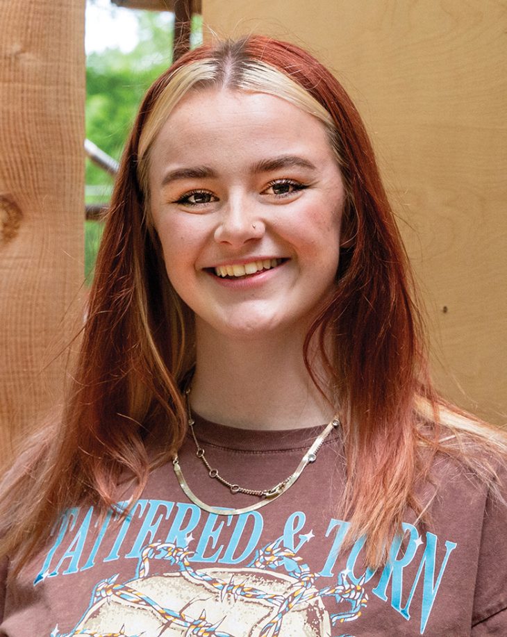 Headshot of a female with blonde and red hair