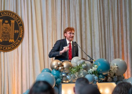  Peter Walpole ’15 giving his acceptance speech at the 2025 Top 10 Under 10 Alumni Awards Ceremony on the campus of Elon University