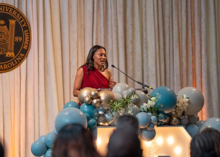 Simone Jackson ’16 giving her acceptance speech at the 2025 Top 10 Under 10 Alumni Awards Ceremony on the campus of Elon University