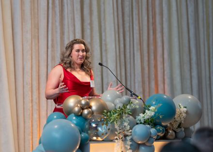 Lauren Brzowski ’19 giving her acceptance speech at the 2025 Top 10 Under 10 Alumni Awards Ceremony on the campus of Elon University