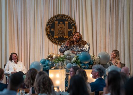 Yasmine Arrington Brooks ’15 giving her acceptance speech at the 2025 Top 10 Under 10 Alumni Awards Ceremony on the campus of Elon University