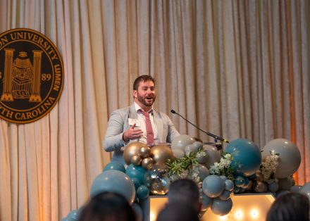 Vaughn Vreeland ’15 giving his acceptance speech at the 2025 Top 10 Under 10 Alumni Awards Ceremony on the campus of Elon University