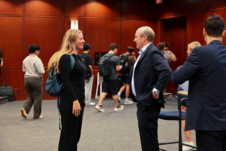 CEO of Advance Auto Parts, Shane O'Kelly, speaking with student at Elon University