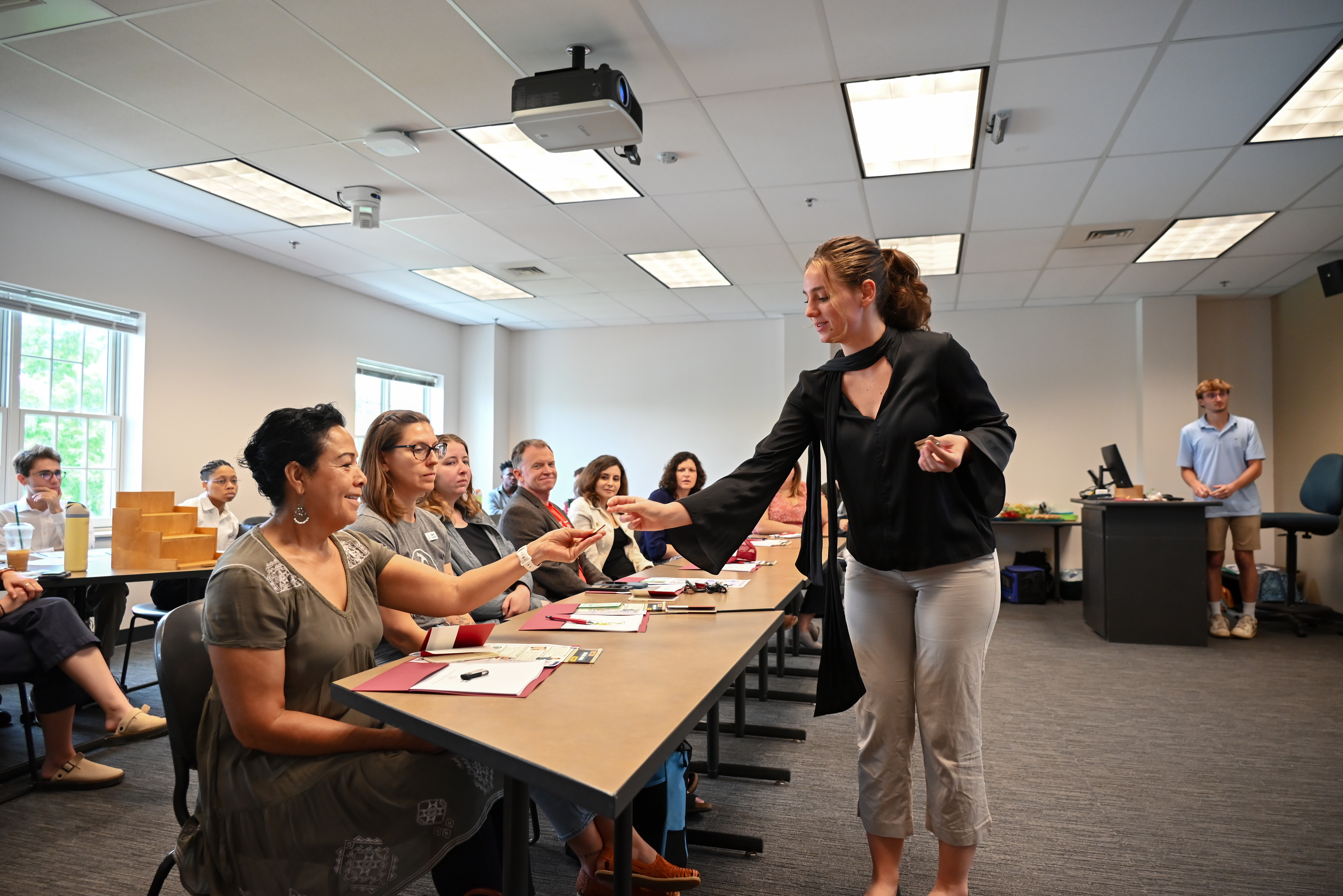 Elon University students presenting their final projects to local non-profits