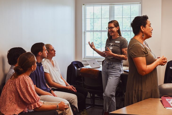 Elon University students presenting their final projects to local non-profits