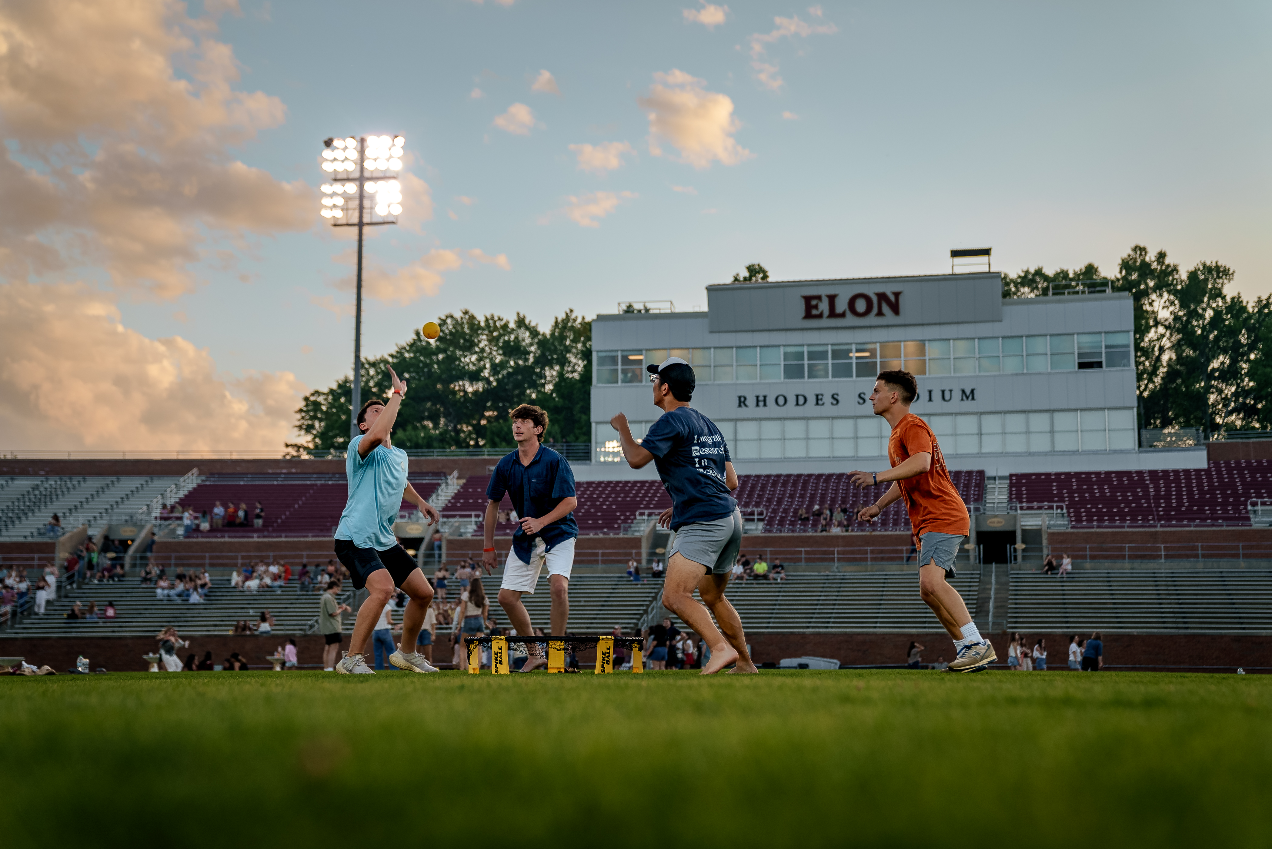 Students play a game on a field
