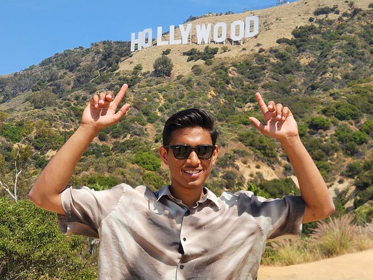 Shreyas Kumar '26 in front of the Hollywood sign in Los Angeles, California.