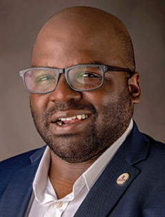 Headshot of Elon University Assistant Professor of Sport Management Khirey Walker