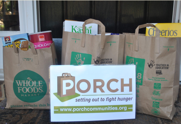 Photo of grocery bags on a front porch ready for pick up by PORCH Communities